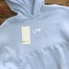 Buzo Hoodie Celeste LF